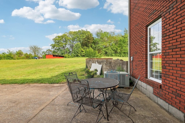 4025 Moore Hollow Rd, Woodlawn, TN 37191 - view of patio / terrace with outdoor dining space and central AC