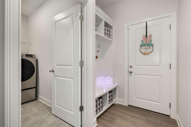 4372 Spregan Way, Smyrna, TN 37167 - mudroom featuring light wood-style floors, washer / dryer, and baseboards