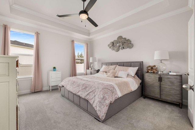 4372 Spregan Way, Smyrna, TN 37167 - bedroom with ornamental molding, a ceiling fan, a tray ceiling, and light carpet