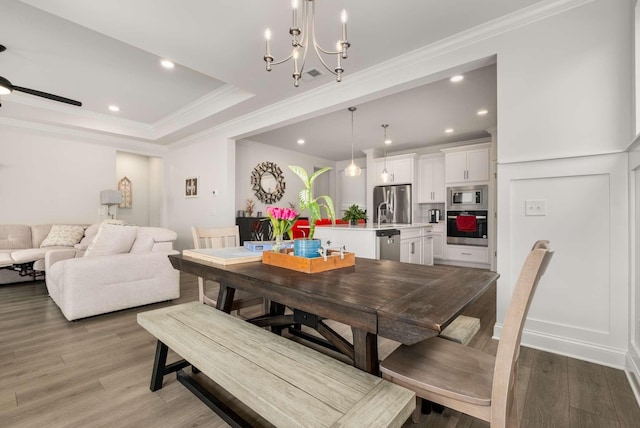 4372 Spregan Way, Smyrna, TN 37167 - dining area with light wood-style flooring, visible vents, recessed lighting, ornamental molding, and ceiling fan with notable chandelier