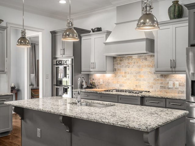 1504 Registry Row, Arrington, TN 37014 - kitchen with a kitchen breakfast bar, stainless steel appliances, decorative backsplash, custom range hood, and gray cabinetry