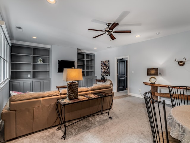 1504 Registry Row, Arrington, TN 37014 - carpeted living room featuring visible vents, baseboards, ceiling fan, recessed lighting, and built in shelves
