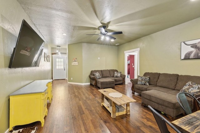 living room with a ceiling fan and wood finished floors