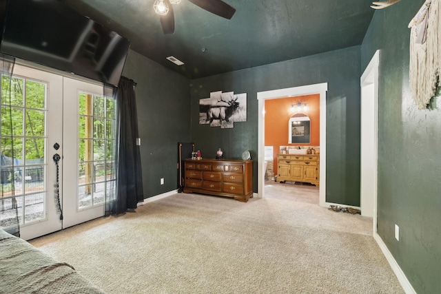 bedroom with visible vents, access to exterior, carpet floors, and connected bathroom