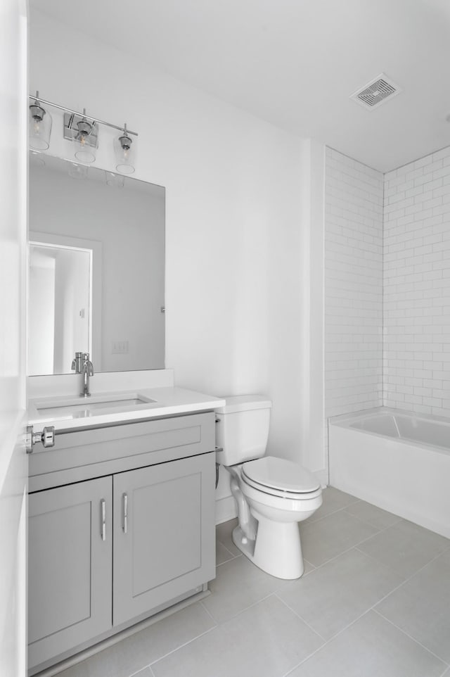 bathroom featuring tile patterned floors, toilet, shower / tub combination, vanity, and visible vents