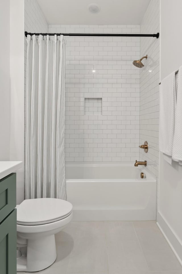bathroom with tile patterned floors, shower / bathtub combination with curtain, vanity, and toilet