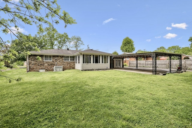 back of house with central air condition unit and a patio area