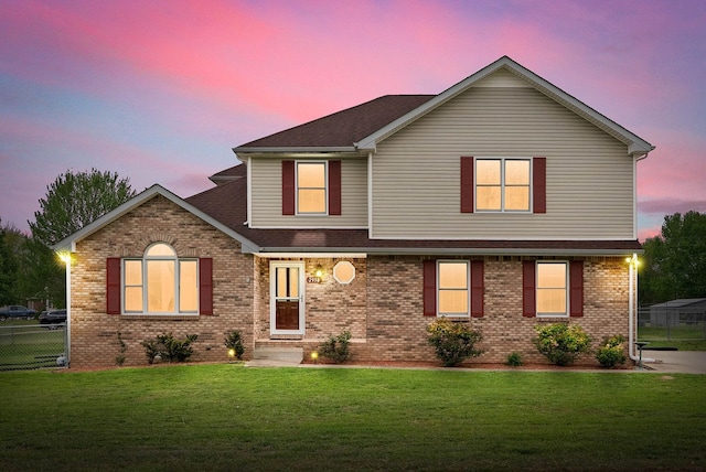 2938 Heatherfield Dr, Woodlawn, TN 37191 - view of front facade with brick siding and roof with shingles