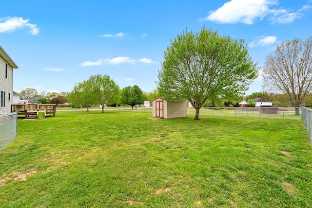 2938 Heatherfield Dr, Woodlawn, TN 37191 - view of yard with a storage unit, an outbuilding, and a deck