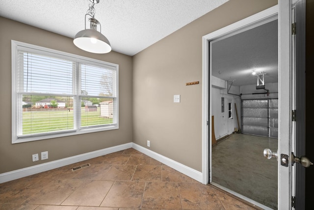 2938 Heatherfield Dr, Woodlawn, TN 37191 - empty room featuring baseboards and a textured ceiling