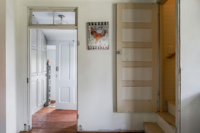 hall featuring wood finished floors