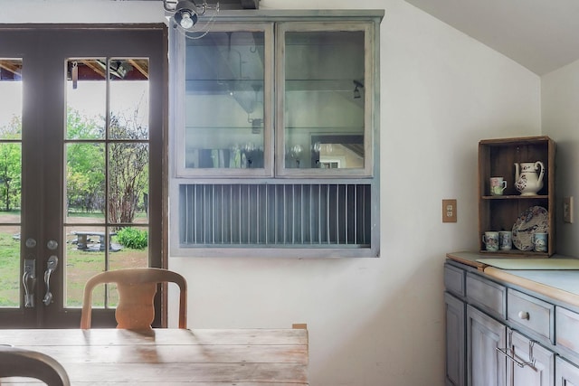 dining room with lofted ceiling