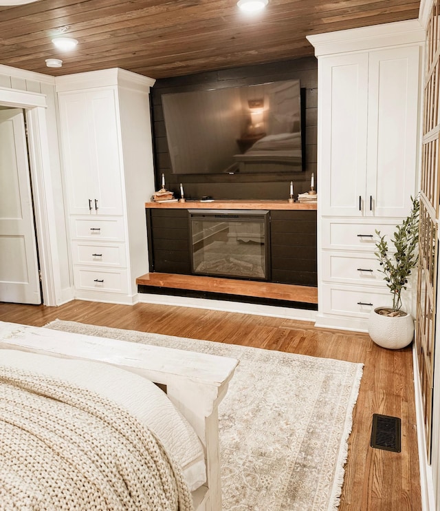 233 Garner Ln, Lawrenceburg, TN 38464 - bedroom featuring recessed lighting, wood ceiling, visible vents, and light wood-style floors