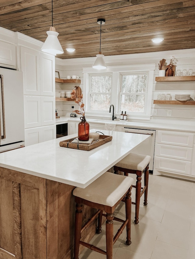 233 Garner Ln, Lawrenceburg, TN 38464 - kitchen with wood ceiling, a kitchen breakfast bar, open shelves, and white cabinets