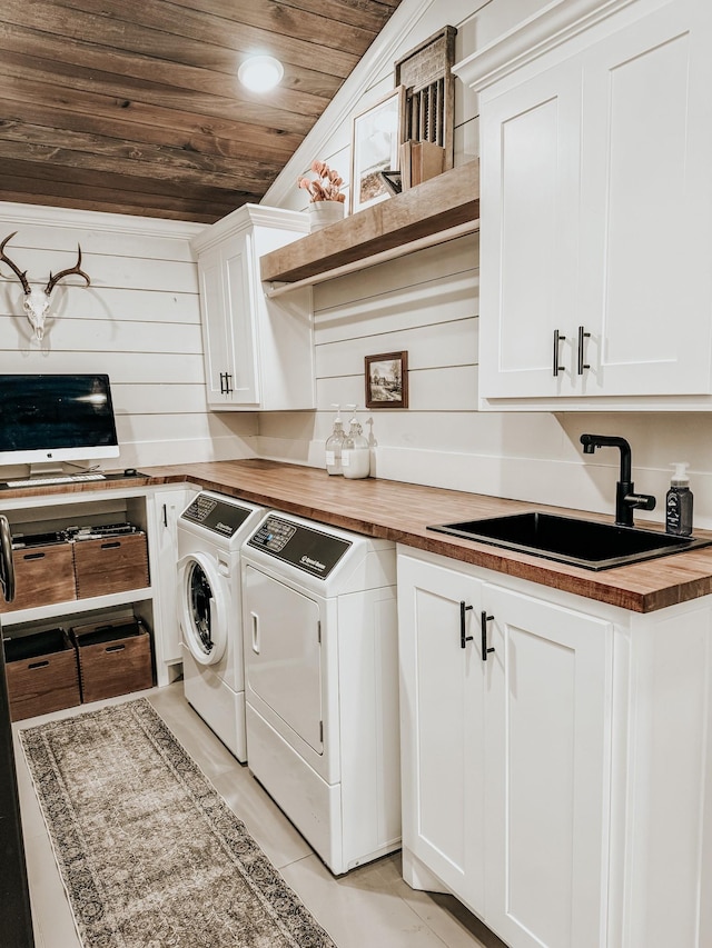233 Garner Ln, Lawrenceburg, TN 38464 - washroom with washer and dryer, a sink, cabinet space, and wood ceiling