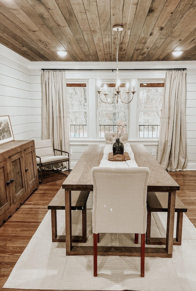 233 Garner Ln, Lawrenceburg, TN 38464 - dining room featuring wood finished floors, a healthy amount of sunlight, a notable chandelier, and wooden ceiling