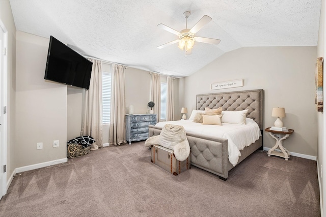 carpeted bedroom featuring a textured ceiling, ceiling fan, lofted ceiling, and baseboards