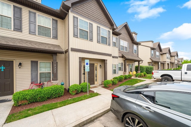 townhome / multi-family property with a residential view