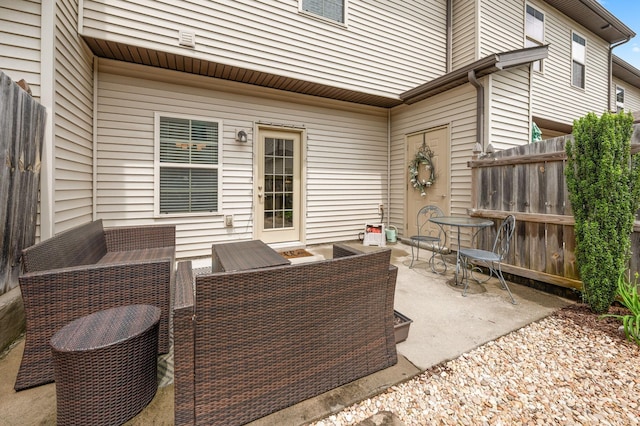 view of patio / terrace featuring outdoor lounge area, outdoor dining area, and fence