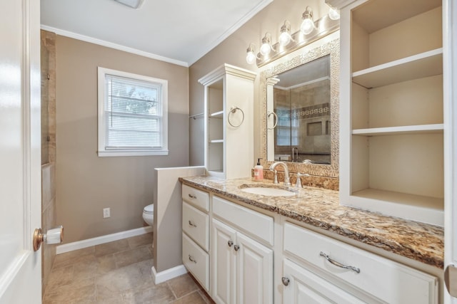bathroom featuring vanity, toilet, a stall shower, baseboards, and ornamental molding