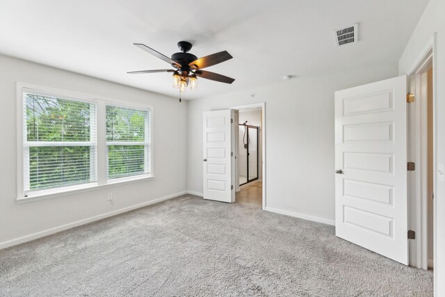 3227 Brookberry Ln, Murfreesboro, TN 37129 - unfurnished bedroom featuring baseboards, carpet flooring, and a ceiling fan