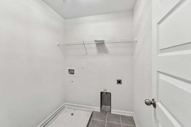 3227 Brookberry Ln, Murfreesboro, TN 37129 - clothes washing area featuring electric dryer hookup, hookup for a washing machine, dark tile patterned flooring, and baseboards