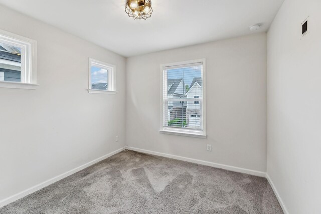 3227 Brookberry Ln, Murfreesboro, TN 37129 - spare room with carpet, baseboards, and a smoke detector