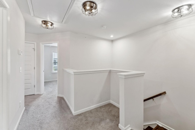 3227 Brookberry Ln, Murfreesboro, TN 37129 - hallway with an upstairs landing, attic access, carpet floors, and baseboards