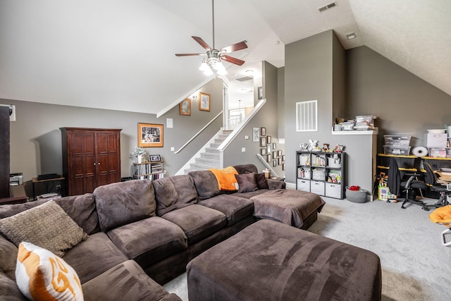 living room featuring visible vents, carpet flooring, ceiling fan, and lofted ceiling