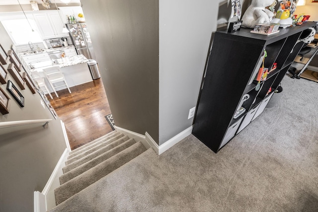 stairway with baseboards