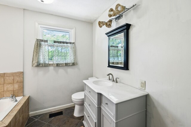 2608 Walnut Ln, Murfreesboro, TN 37129 - bathroom featuring a wealth of natural light, tile patterned flooring, a bath, and vanity