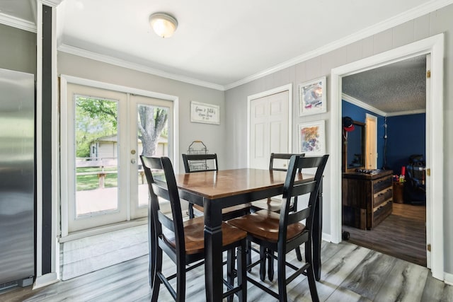 2608 Walnut Ln, Murfreesboro, TN 37129 - dining space with ornamental molding, wood finished floors, and french doors