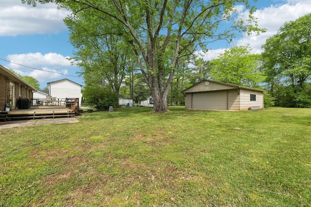 2608 Walnut Ln, Murfreesboro, TN 37129 - view of yard featuring an outbuilding, a wooden deck, and a garage