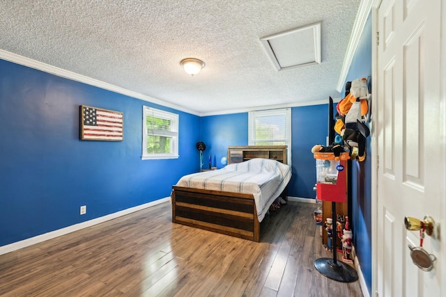 2608 Walnut Ln, Murfreesboro, TN 37129 - bedroom featuring hardwood / wood-style flooring, attic access, ornamental molding, baseboards, and a textured ceiling