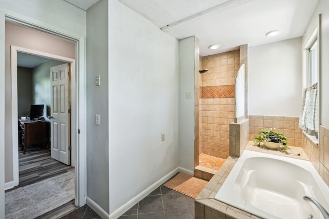 2608 Walnut Ln, Murfreesboro, TN 37129 - full bath featuring tile patterned floors, walk in shower, a bath, and baseboards