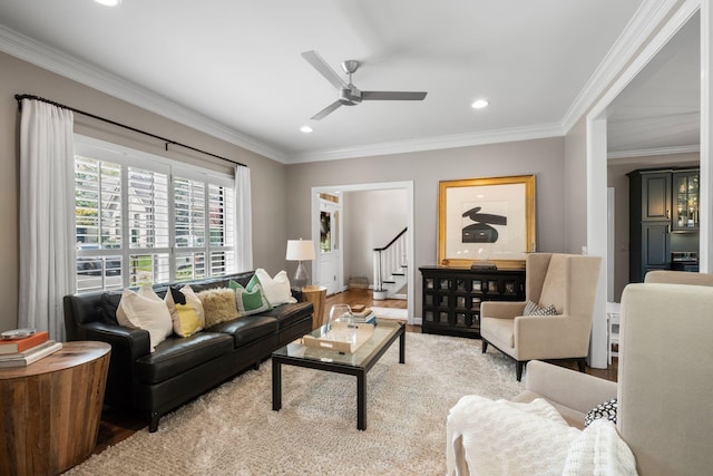 living room featuring recessed lighting, ceiling fan, stairs, and crown molding