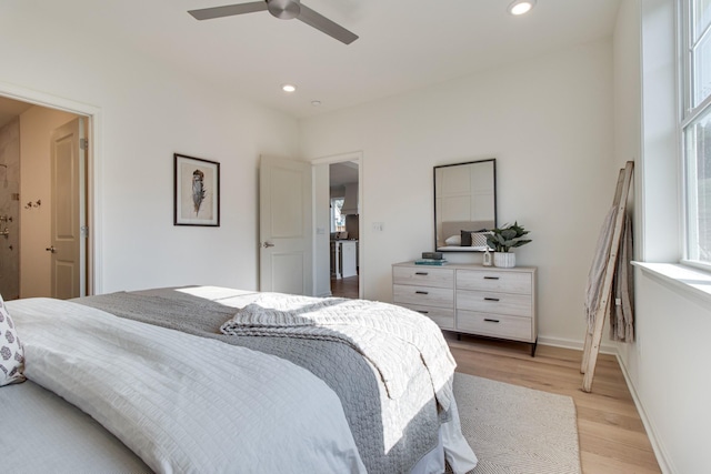 bedroom with baseboards, recessed lighting, a ceiling fan, and light wood-style floors