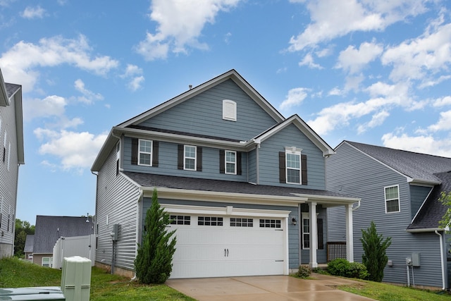 view of front of property with an attached garage and driveway