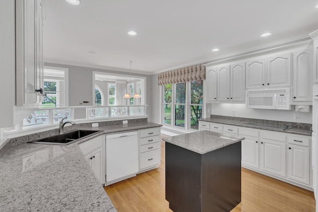 5112 Herschel Spears Cir, Brentwood, TN 37027 - kitchen with a wealth of natural light, ornamental molding, white appliances, and a sink