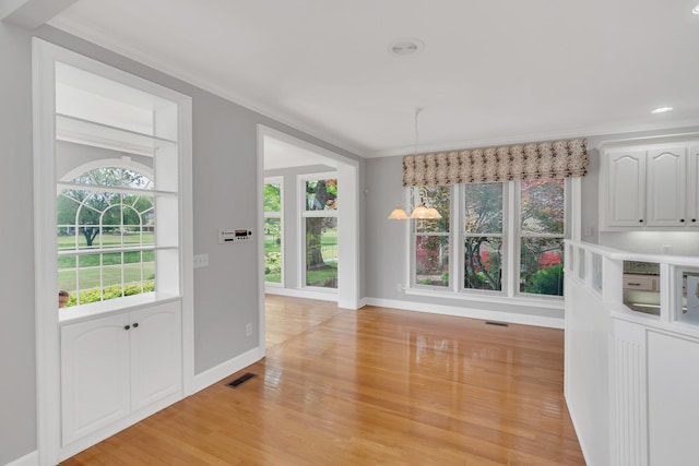 5112 Herschel Spears Cir, Brentwood, TN 37027 - unfurnished dining area featuring visible vents, baseboards, light wood-type flooring, recessed lighting, and ornamental molding