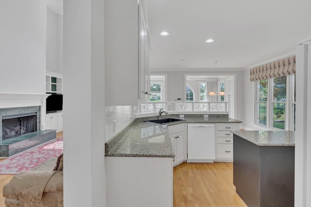 5112 Herschel Spears Cir, Brentwood, TN 37027 - kitchen featuring white cabinetry, a healthy amount of sunlight, white dishwasher, and a sink