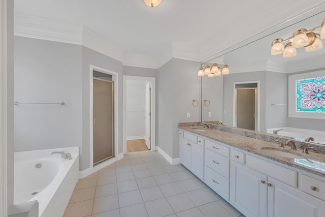 5112 Herschel Spears Cir, Brentwood, TN 37027 - full bathroom with ornamental molding, a garden tub, double vanity, and a sink