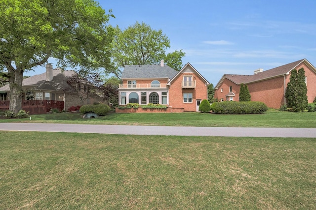 5112 Herschel Spears Cir, Brentwood, TN 37027 - traditional-style house with a front yard, a chimney, and brick siding