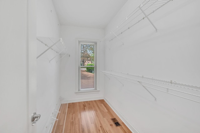 5112 Herschel Spears Cir, Brentwood, TN 37027 - walk in closet with visible vents and light wood-style floors