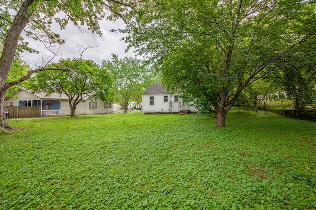 view of yard featuring fence