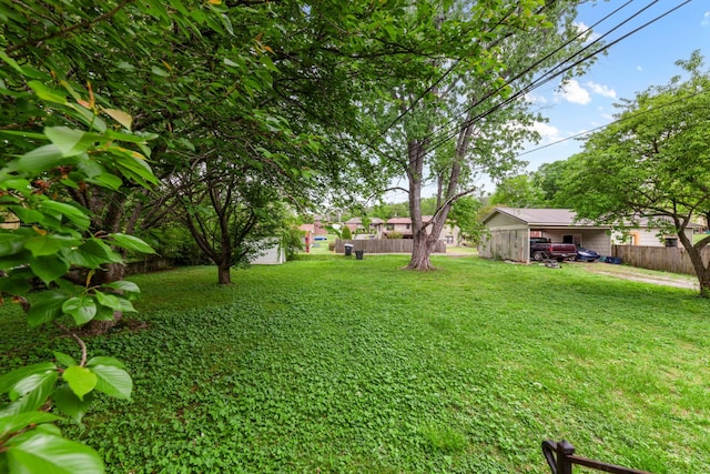 view of yard with fence