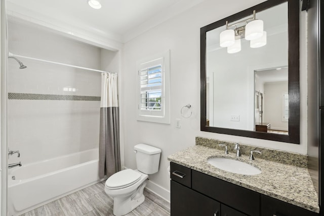full bathroom with vanity, shower / bath combination with curtain, toilet, baseboards, and wood finished floors