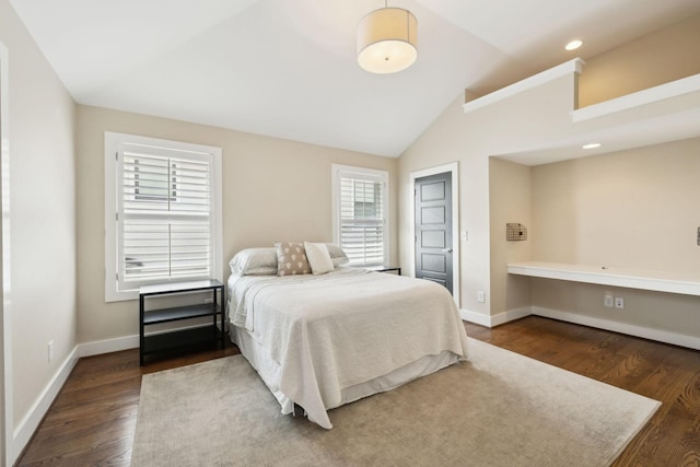 bedroom featuring lofted ceiling, wood finished floors, recessed lighting, and baseboards