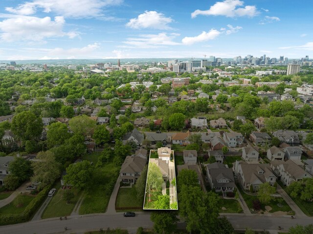 birds eye view of property featuring a city view