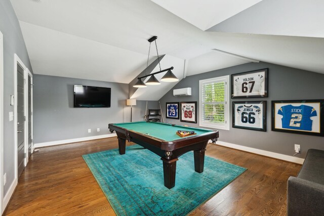 playroom featuring wood finished floors, pool table, vaulted ceiling, a wall mounted air conditioner, and baseboards